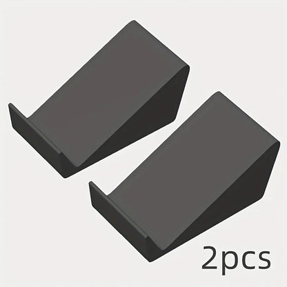 Black plastic universal adjustable soundbar stand base designed for optimal smartphone and speaker display angle