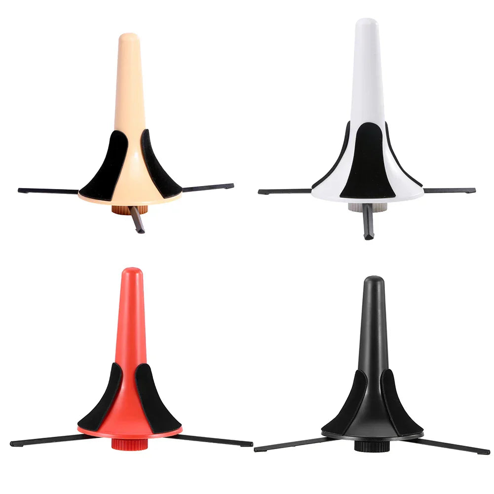 Beige white red and black plastic foldable portable trumpet stands with rubberized grips and folding lightweight tripod design