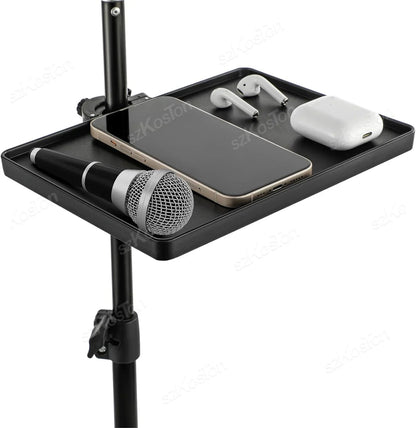 Black plastic microphone stand tray with o-style buckle lock and flat surface holding electronic devices for recording