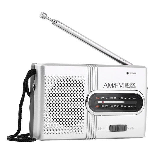 Silver am/fm bc-r21 mini radio stereo with telescopic antenna and black carrying strap for portable music use