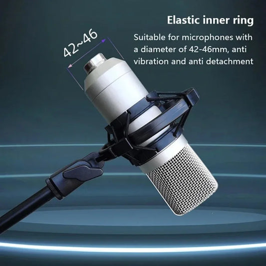 Silver universal professional condenser microphone with mesh grille and black shock mount studio recording bracket holder