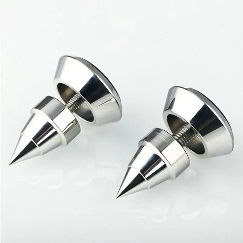 Shiny chrome-finished universal speaker isolation spikes with conical design and threaded bases for shockproof foot mat use