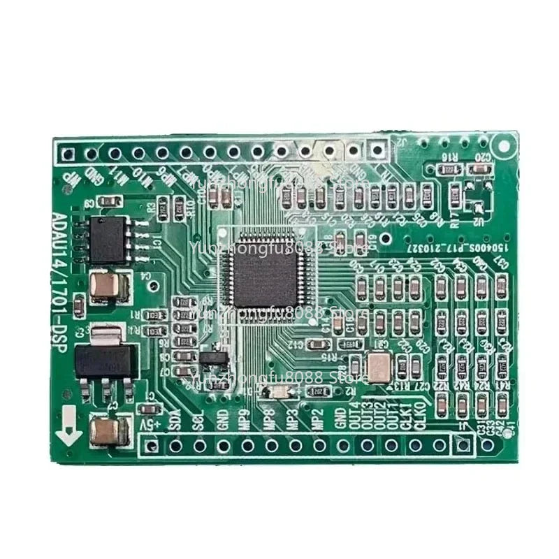 Green rectangular circuit board with black integrated circuit and components for dspmini learning board upgrades music experience
