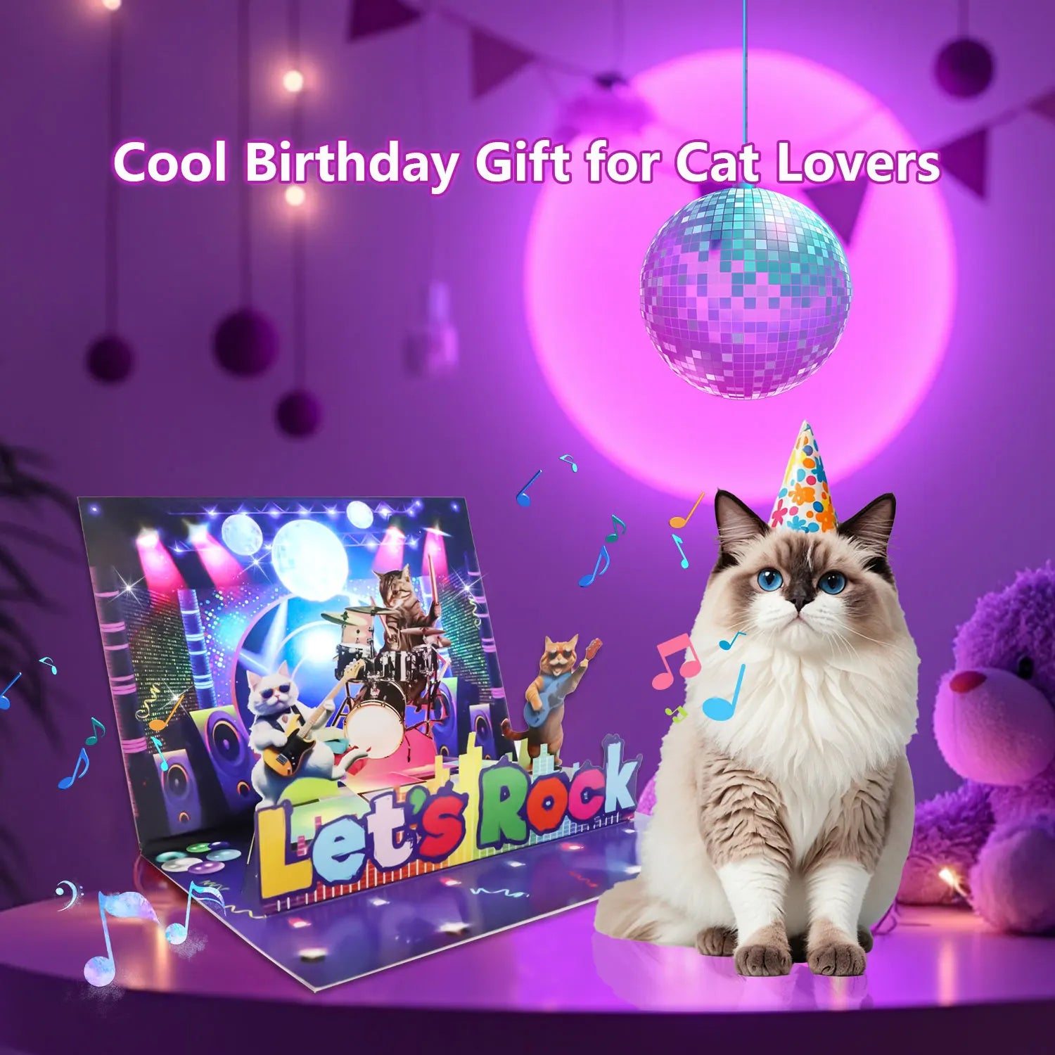 A cream and brown cat wearing a party hat sits before a vibrant rock cat 3d pop musical birthday card with lights