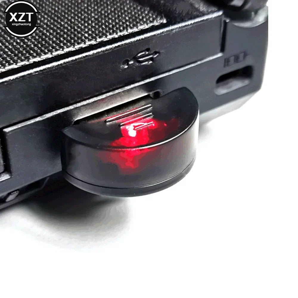Black usb 2.0 mic audio adapter with a translucent red led on curved cap for portable studio speech and speech driver free use