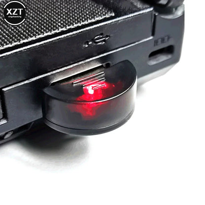 Black usb 2.0 mic audio adapter with a translucent red led on curved cap for portable studio speech and speech driver free use