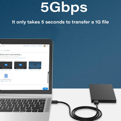 Black external hard drive connected to laptop with a usb 3.0 extension cable for 5gbps fast transmission data cable