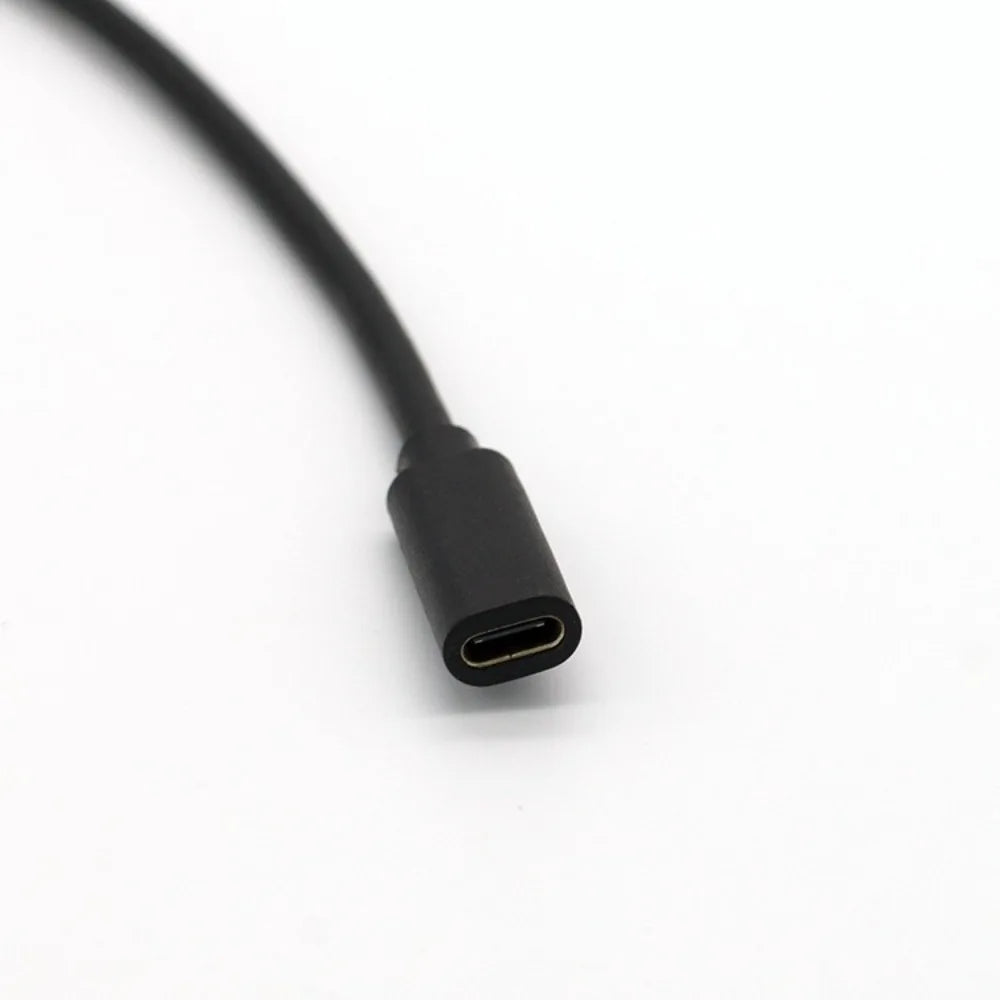 Black usb 3.0 male to type-c female extension cable with matte plastic housing compatible with usb c interface hubs card readers