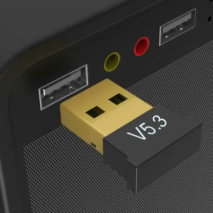 Gold-colored usb bluetooth 5.3 adapter with black label plugged into device port wireless usb adapter audio bluetooth dongle