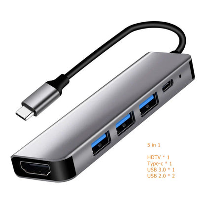 Silver 5-in-1 type-c usb hub with matte finish featuring hdmi hdtv type-c usb ports and black cable for laptops