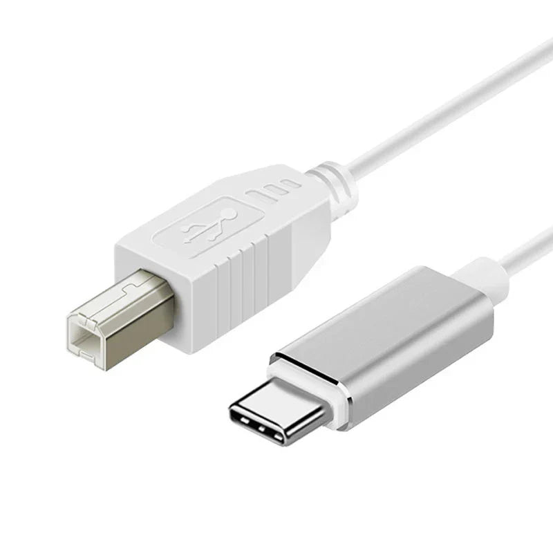 White usb-a to usb-c adapter cable with metallic connector and plastic housing for midi controller keyboard audio interface