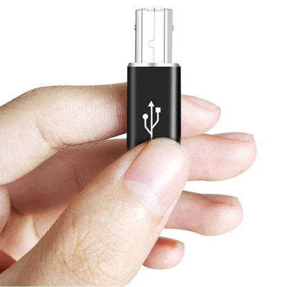 Black usb-a to micro-usb adapter with silver connectors and usb symbol for midi controller data transfer and canon printer scanner