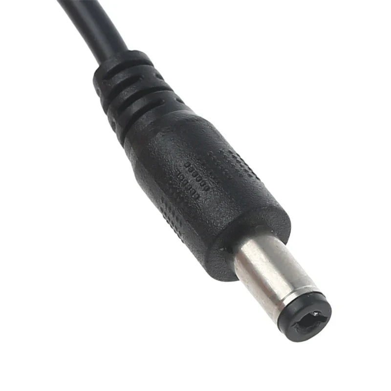 Black plastic dc power adapter connector with metallic pin and textured grip for wireless router laptop led strip speaker cctv