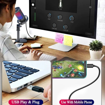 Black usb cable with standard connector plugged into laptop and smartphone for gaming with usb condenser metal microphone professional recording streaming desktop podcast microphone