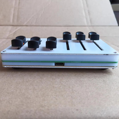 White rectangular midi fader controller with custom cc mapping, black knobs, green stripe, and usb-c port for type beat music