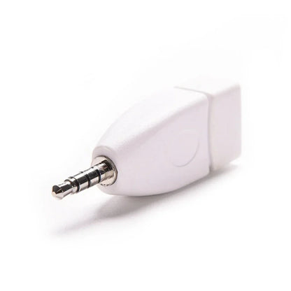 White plastic usb audio adapter with silver 3.5mm male plug and rectangular usb female connector for aux car audio use