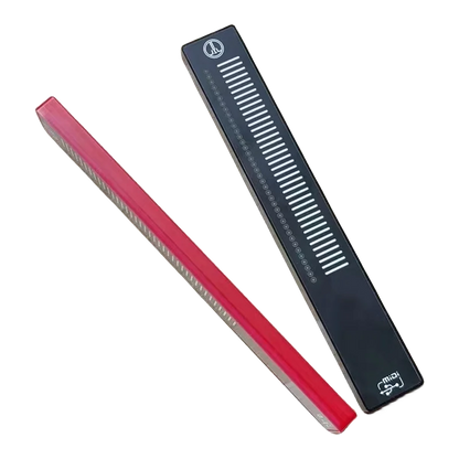 Red and black plastic comb with white teeth and measurement markings for sliding touch music controller volume anchors recording use