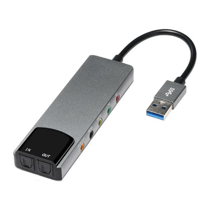 Gray aluminum usb 3.0 audio adapter with color-coded rca jacks and blue usb connector supports surround sound 48khz samplingrate digital record