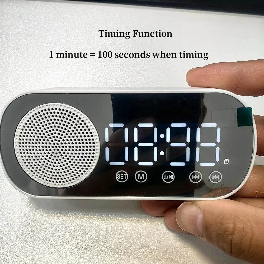 White USB plug-in mirror digital alarm clock with wireless speaker subwoofer and buttons below the display for desktop music player
