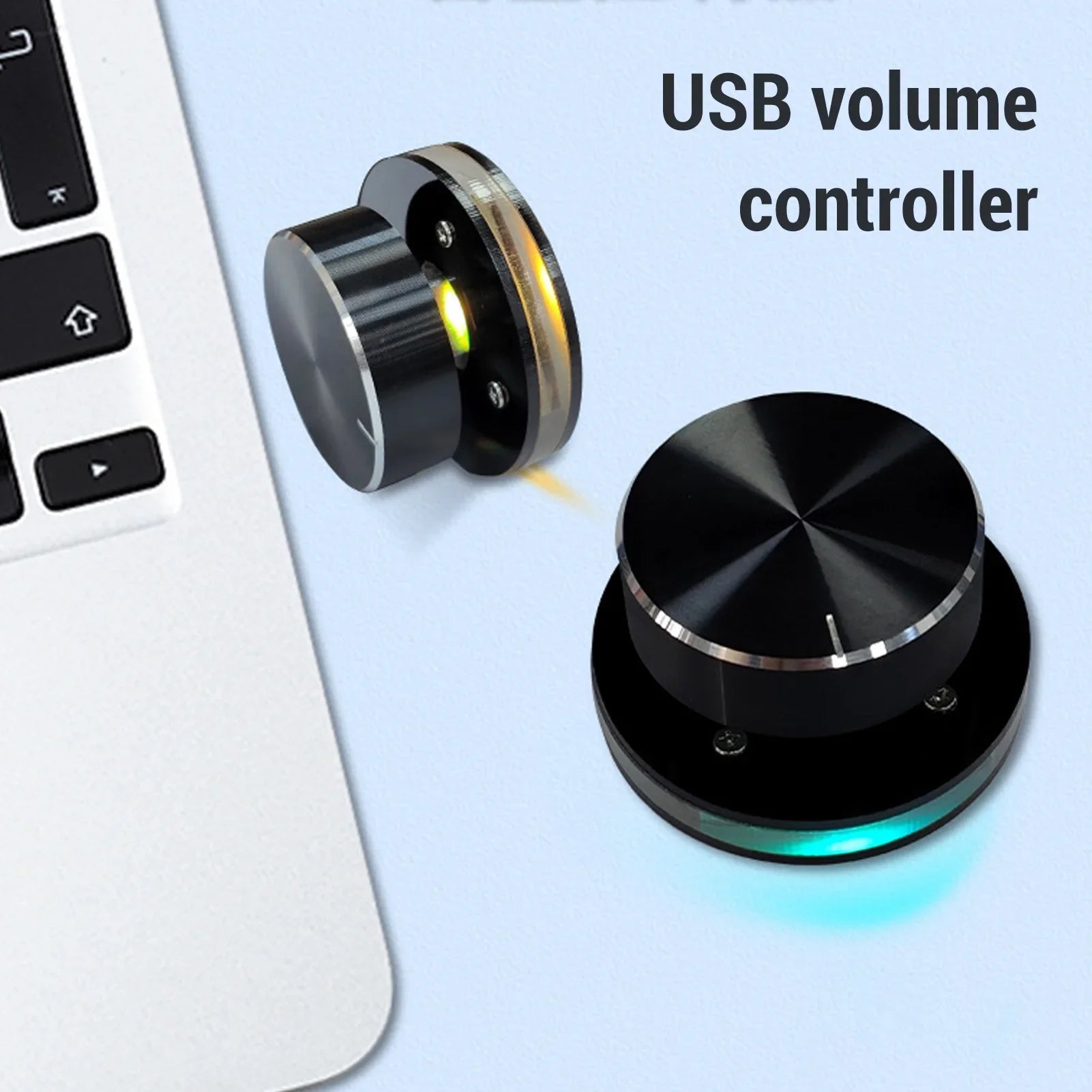 Black usb volume control knob with silver accents and glowing rgb led lights for pc multimedia use