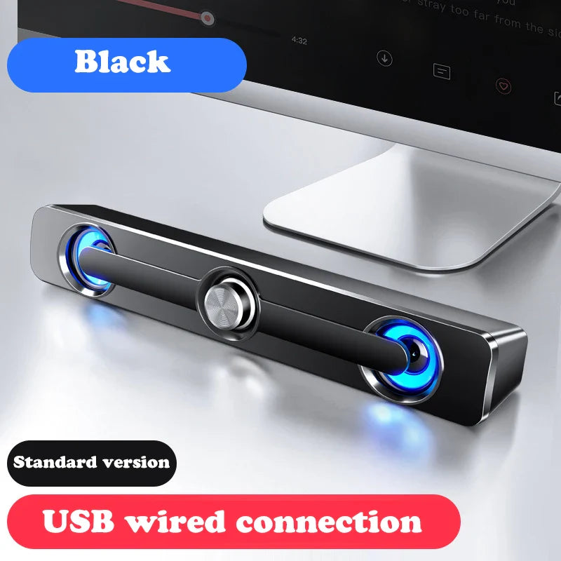 Black usb wired powerful computer speaker bar with blue illuminated drivers and central metallic knob for surround sound box
