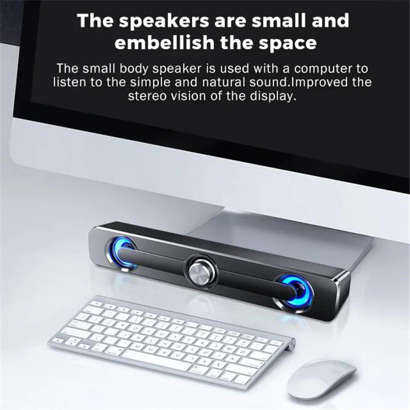 Black rectangular usb wired powerful computer speaker bar with blue illuminated drivers and silver rotary knob surround sound box