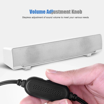 White rectangular soundbar music player with perforated grille and black power cable for surround sound box bass use