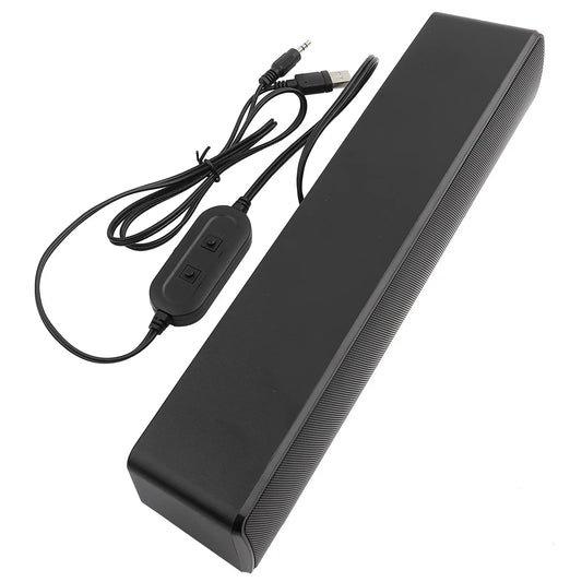 Black rectangular usb wired stereo soundbar with textured grille bass surround sound and 3.5mm input jack cable and remote