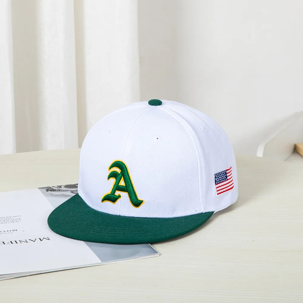 Hip-hop style baseball cap with a flat top, color patching, letter embroidery. Suitable for both women and men