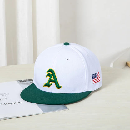 Hip-hop style baseball cap with a flat top, color patching, letter embroidery. Suitable for both women and men