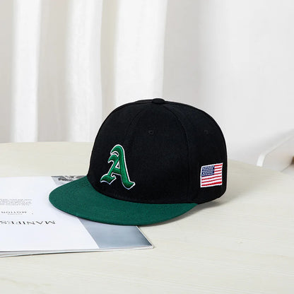 Hip-hop style baseball cap with a flat top, color patching, letter embroidery. Suitable for both women and men