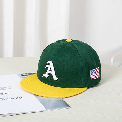 Hip-hop style baseball cap with a flat top, color patching, letter embroidery. Suitable for both women and men