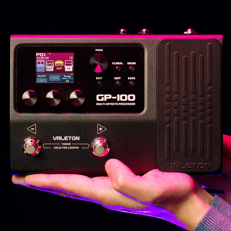 Black valeton gp-100 multi-effects processor pedal with digital display and metallic knobs for electric guitar comprehensive use including bass drum machine and rhythm phrase loop