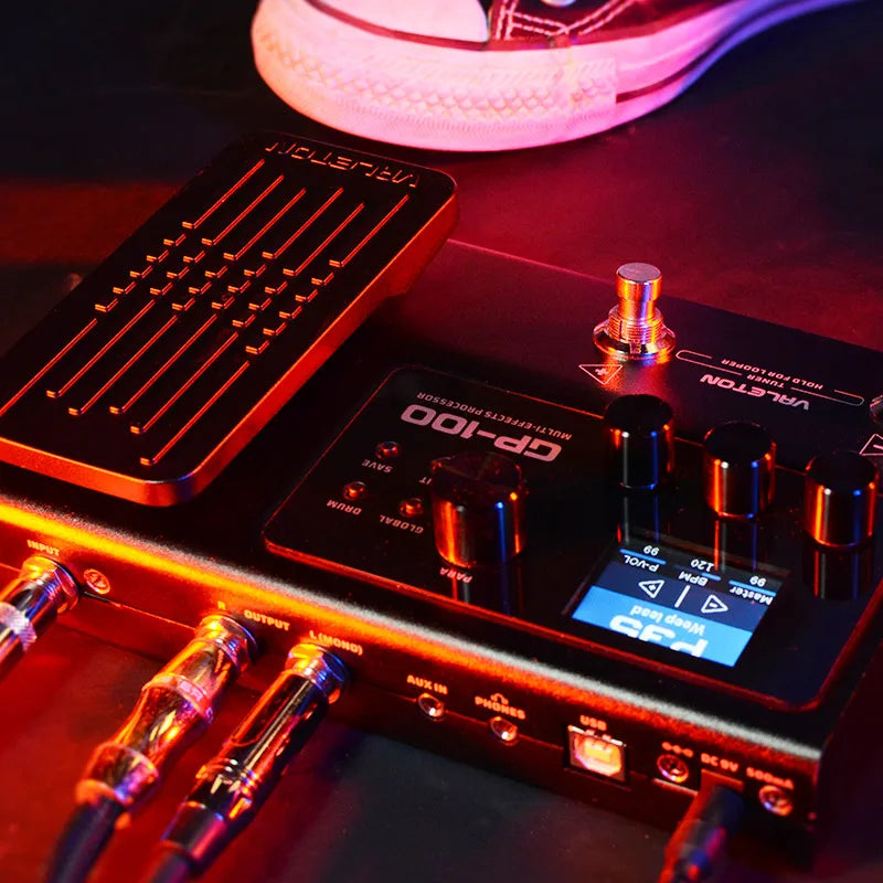 Black valeton gp-100 electric guitar comprehensive multi-effects processor with metallic knobs, blue screen, foot pedal, bass drum machine, rhythm phrase loop
