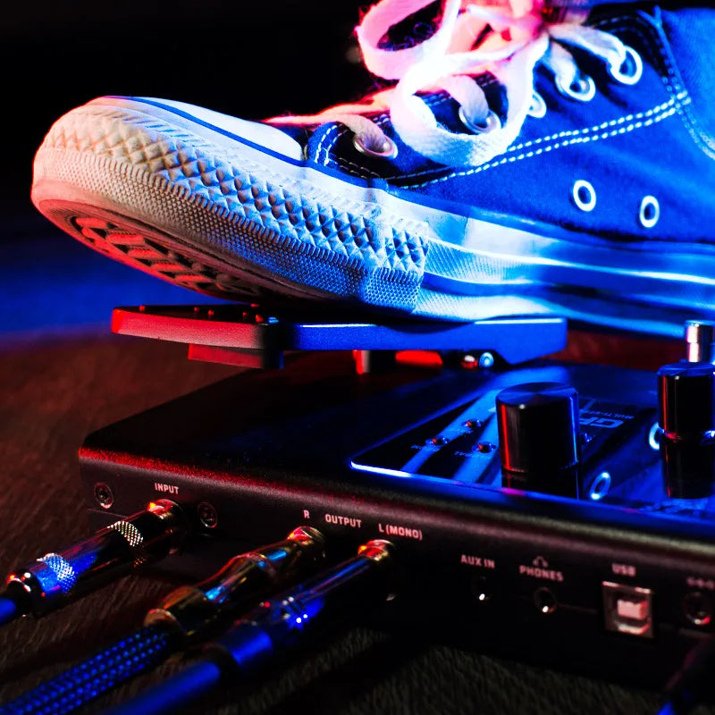 Blue canvas converse chuck taylor all-star sneaker with white laces and rubber sole for rhythm phrase loop use