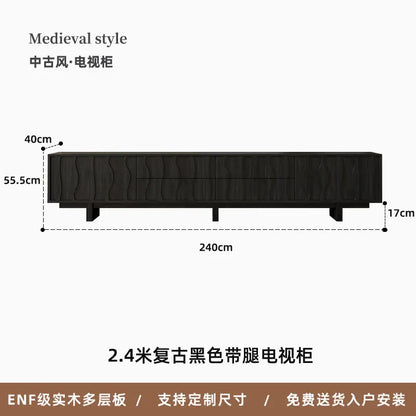 A 2.4 meter black vesa floor aesthetic tv console made of solid wood multilayer board with wavy paneling and sturdy legs