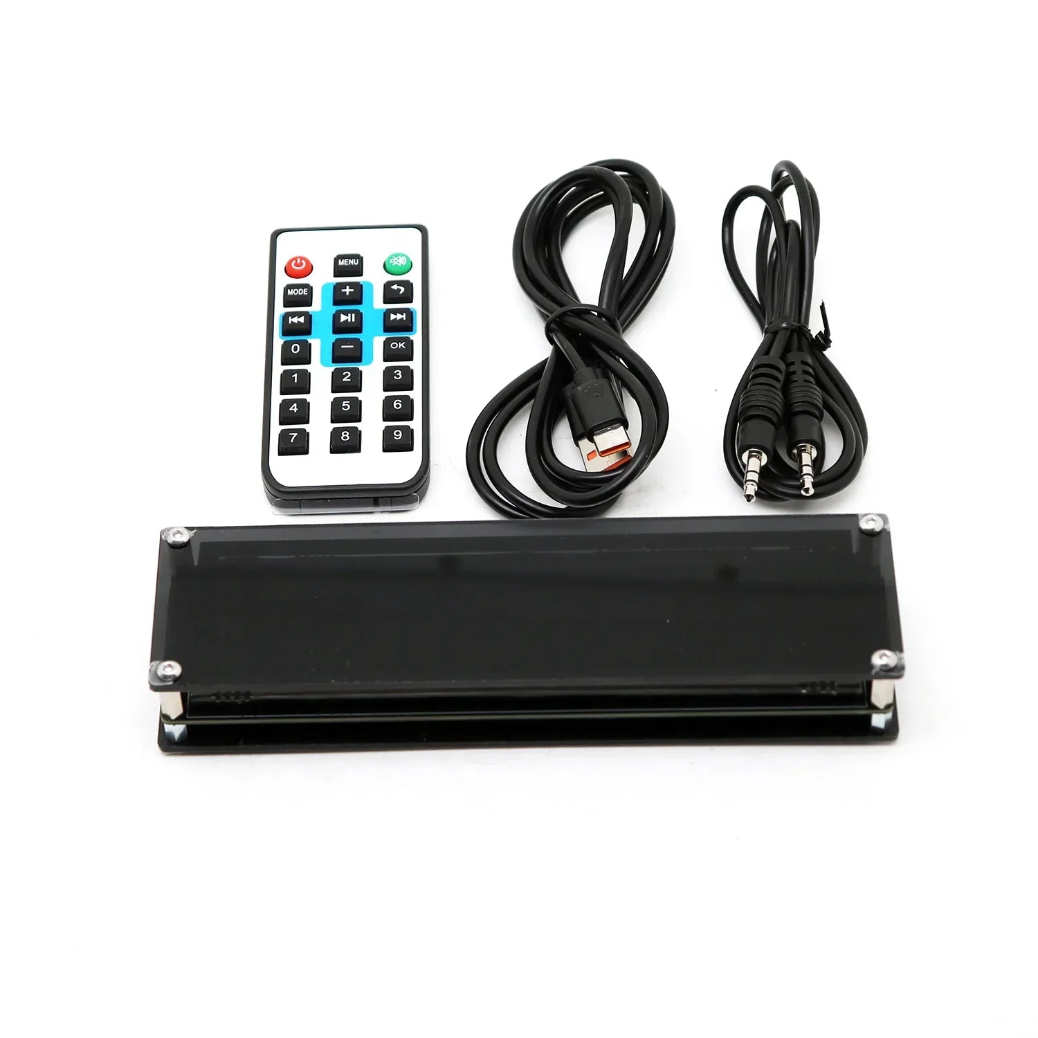 Black rectangular portable media player with silver screws featuring music spectrum vfd clock and remote control functions