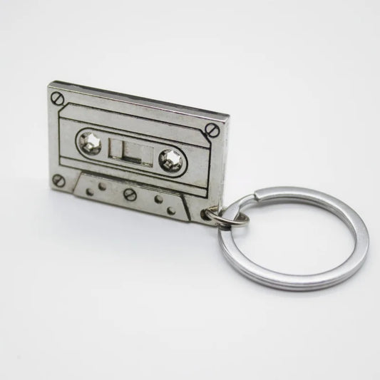 Silver metallic vintage audiotape keychain with embossed details and metal ring hipster cool personality gift