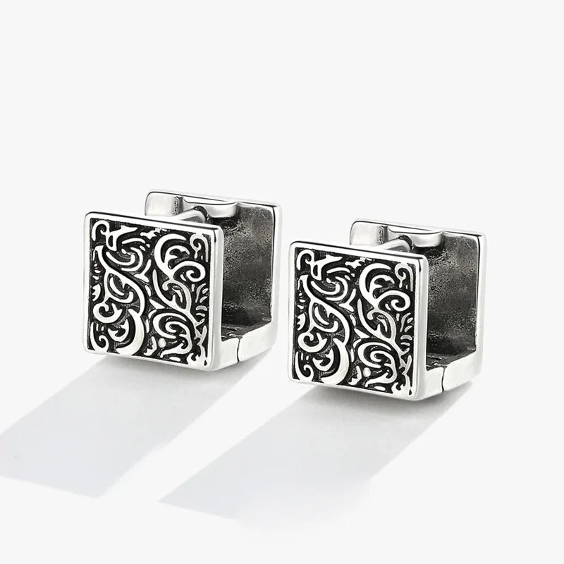 Silver square cufflinks with intricate black scrollwork design in vintage ethnic thai style for chic hoop huggie earrings