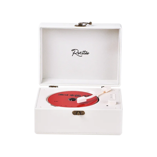 White rexitee portable rechargeable cd music player with red vinyl disc and white stylus in open box speaker portable rechargeable