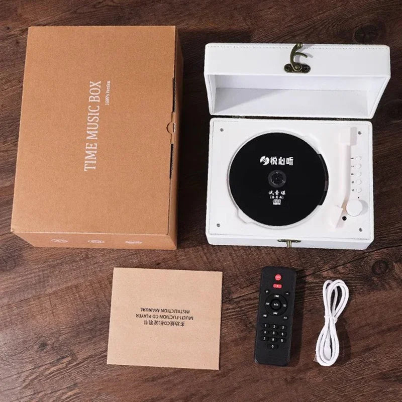White wooden box containing a black vintage leather cd player with silver accents and chinese characters on the disc for customer service and order info