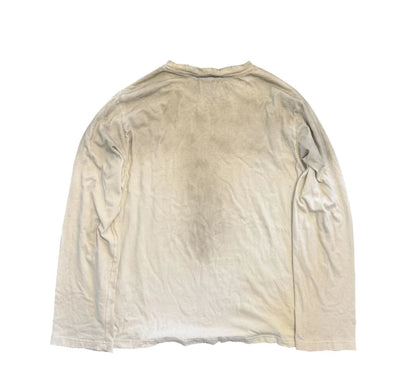 Beige vintage long sleeve t shirt with a faded worn look loose casual tee for hip streetwear harajuku and retro tshirts y2k