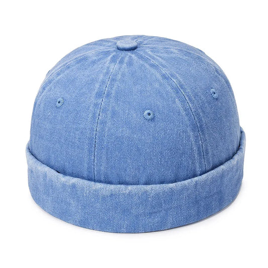 A light blue summer cotton brimless skullies cap with folded brim and subtle stitching for multipurpose use