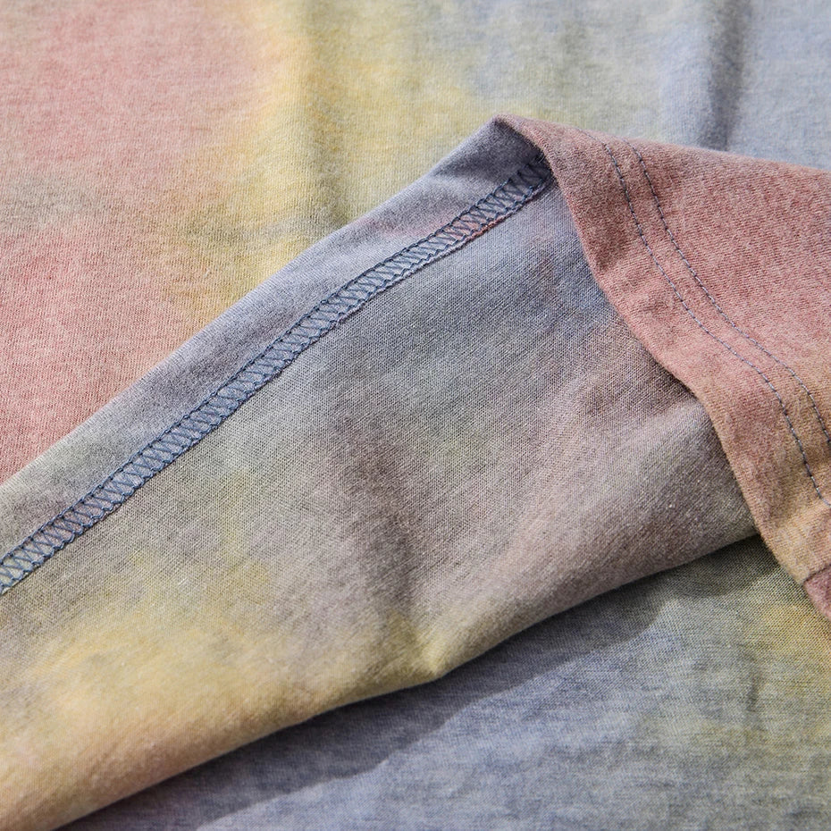 A soft pastel gradient cotton vintage oversized long sleeve tie dye t shirt with neatly stitched hem for casual streetwear