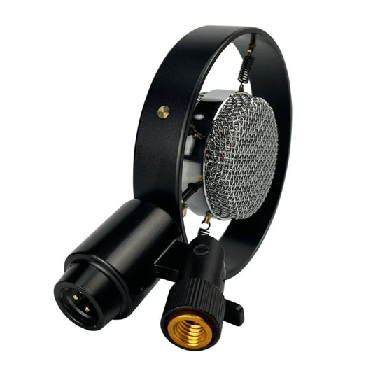 Black vintage retro condenser microphone with silver mesh grille and gold threaded connector for recording video work