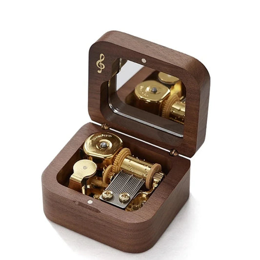 A polished dark wood wooden music box with a golden clockwork musical box mechanism and treble clef emblem for anime game theme songs