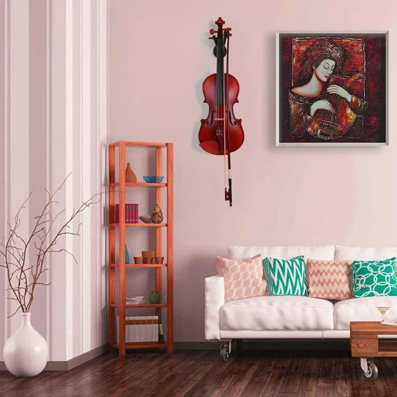 A glossy red violin mounted on a violas hanger for studio music rooms decor turn instrument into art and practice more