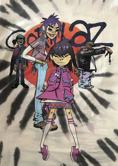White t-shirt with colorful gorillaz band graphic on red circle and black stripes for modern music room decor