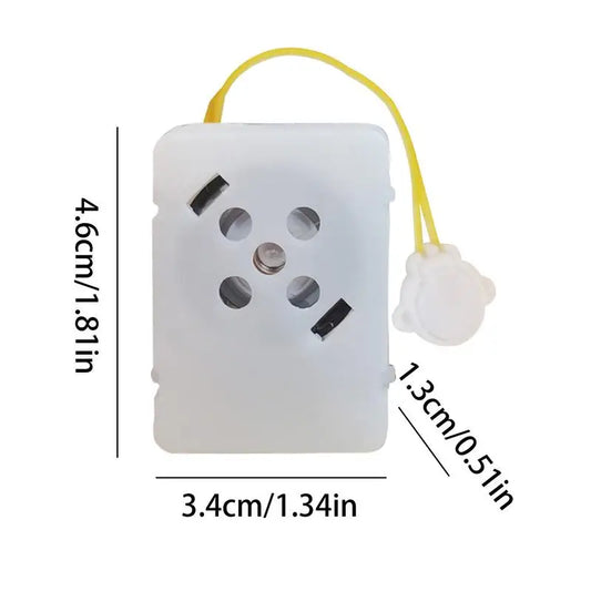 White plastic wall outlet cover with four circular cutouts and yellow cord attached to small bear charm for stuffed animal recordable sound module toy voice message device