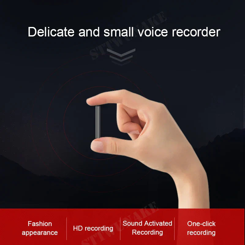 A sleek minimalist black recorder digital flash voice recorder held delicately for activated recording dictaphone use